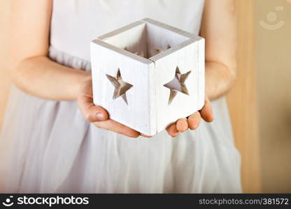 Christmas decor, Girl holding a Christmas candle