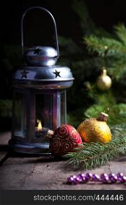 Christmas Decor - lantern with bokeh at the wooden table