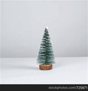 Christmas decor New Year tree on a white background, copy space