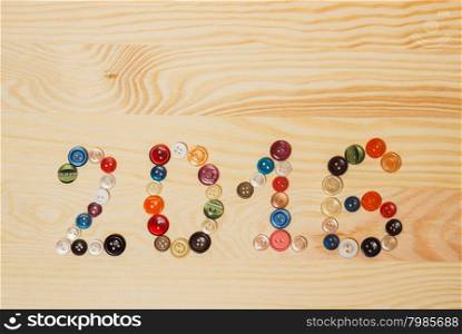 Christmas decoration - 2016 inscription on the light background. Christmas decoration - 2016 inscription on the wooden background