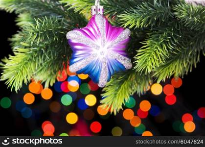 Christmas decoration and blurred lights at background