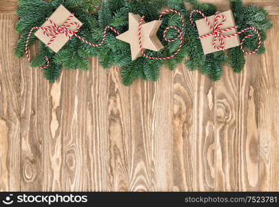 Christmas decoration and gift boxes on wooden background