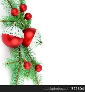 Christmas decoration baubles with branches of fir tree isolated on white background. Free space for your text.