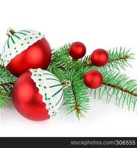 Christmas decoration baubles with branches of fir tree on white background.