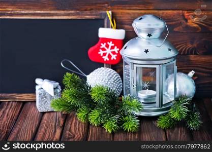 christmas decoration, blackboard and christmas lamp