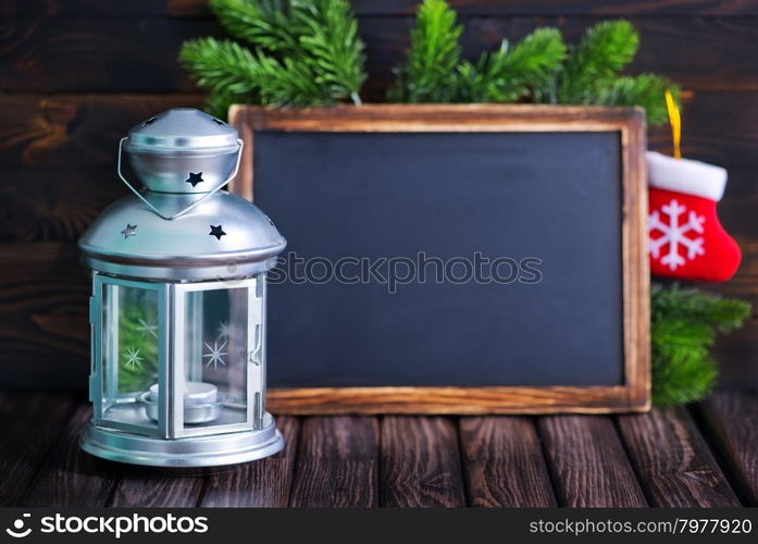 christmas decoration, blackboard and christmas lamp