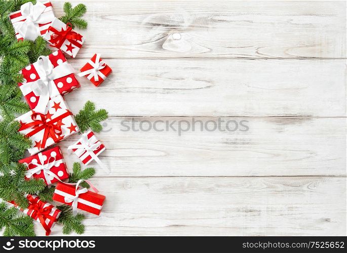 Christmas decoration gift box and pine tree branches. Holidays banner
