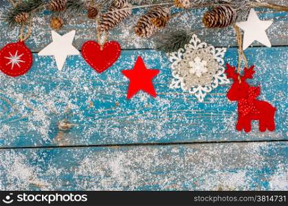 Christmas decoration hanging over wooden background
