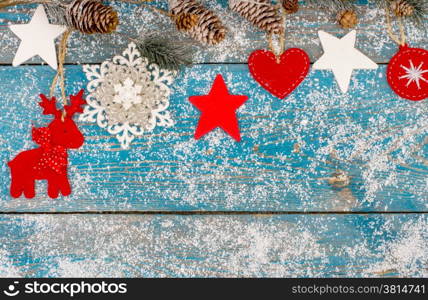 Christmas decoration hanging over wooden background