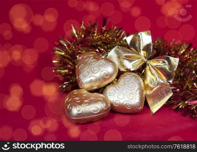 Christmas decoration in shape a heart with ribbon