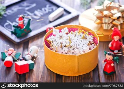 christmas decoration in the golden box and on a table