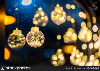 Christmas decoration lights in the shape of a star for with rope on Bokeh background Decoration During Christmas and New Year.