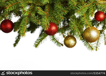 Christmas decoration on fir branch isolated on white background