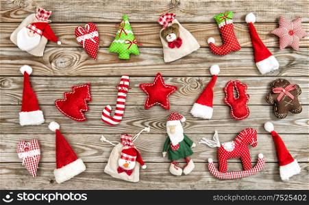 Christmas decoration on rustic wooden background. Vintage style toned picture