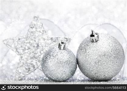 Christmas decoration on silver glitter background