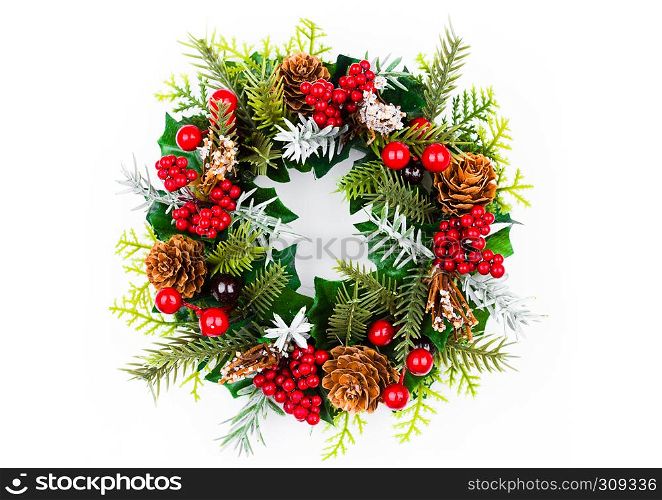 Christmas decoration setup with red and green on white background