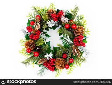 Christmas decoration setup with red and green on white background