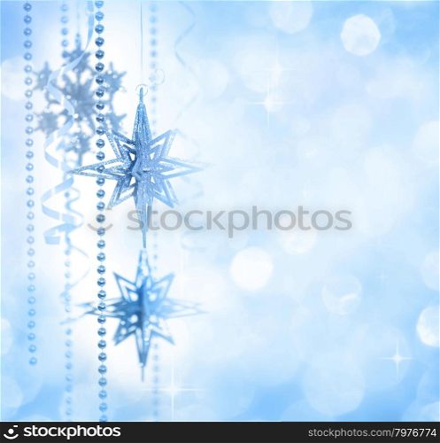 "Christmas Decoration "Star of Bethlehem" on Gold Defocused Background"