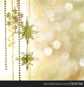 "Christmas Decoration "Star of Bethlehem" on Gold Defocused Background"