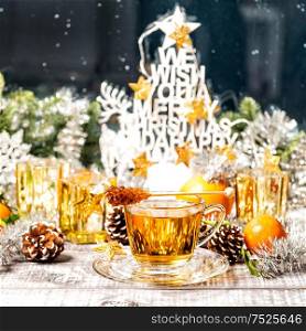 Christmas decoration with cup of tea. Food and drinks