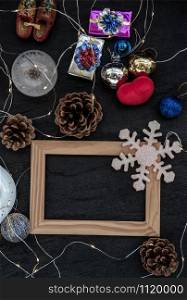 Christmas decoration with Empty wooden frame for work about design element. Selective focus, Top view, copy space
