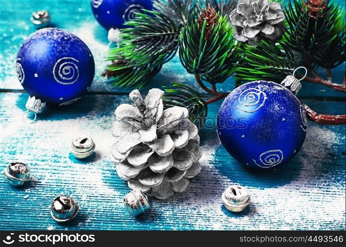 Christmas decoration with fir branch,pine cones and toys