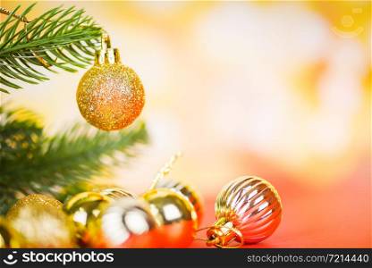 Christmas decoration with golden balls light gold abstract holiday background / christmas tree festive xmas winter and Happy New Year object concept