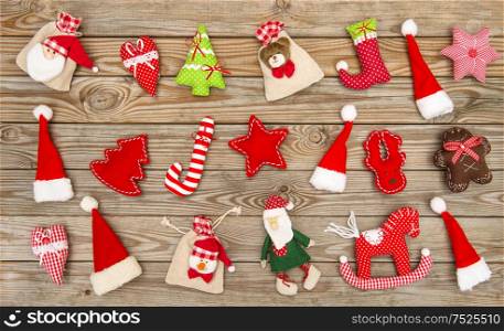 Christmas decorations and ornaments on rustic wooden background