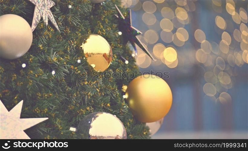 Christmas decorations. Beautiful colored Christmas tree. Concept for holidays and winter season.