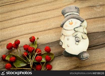 Christmas decorations on a rustic wooden board