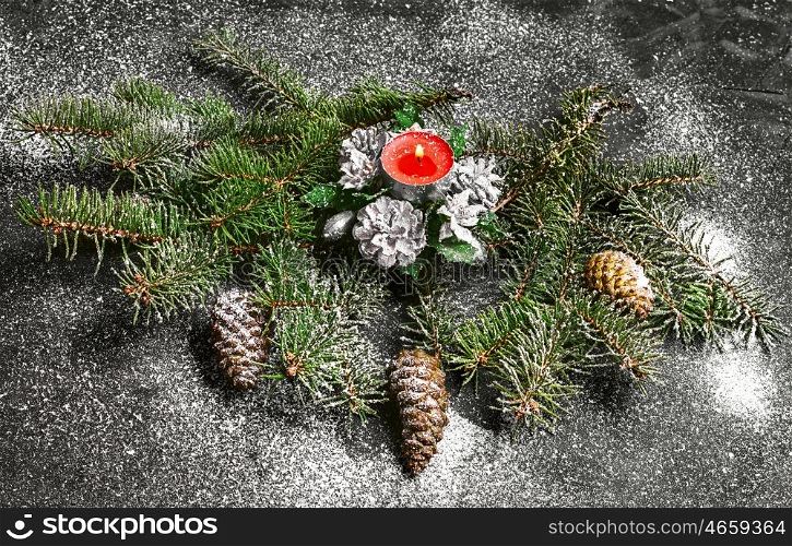 Christmas decorations on the Christmas tree. Spruce branches with pinecones and Christmas ornaments