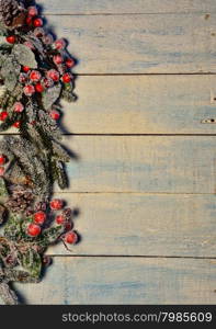 Christmas decorations over old wooden table.