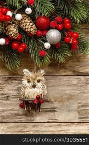 christmas decorations with ornaments on wooden background