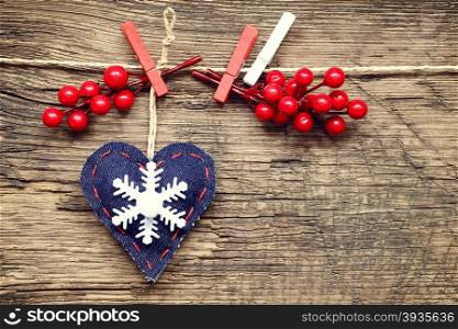 christmas decorations with ornaments on wooden background