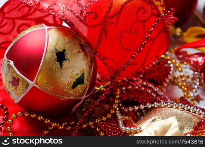 Christmas decorations with red ribbon around white background