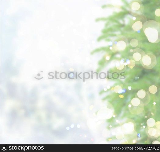 christmas defocosed background with fir tree, bokeh lights and snow. with fir tree and snow