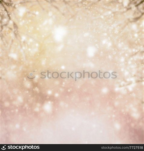 christmas defosued background tree branch and gray gleaming bokeh background, retro toned. christmas background with fir tree and gleaming background