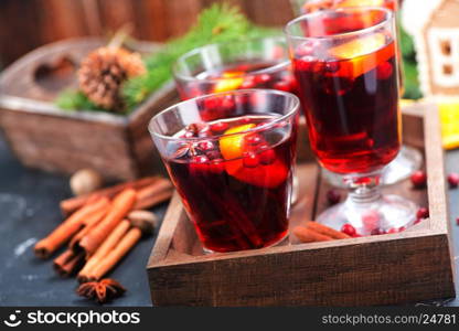christmas drink with aroma spice on a table