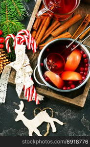 christmas drink with aroma spice on a table