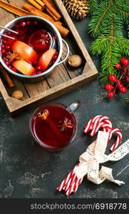 christmas drink with aroma spice on a table