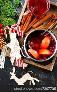 christmas drink with aroma spice on a table