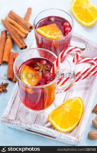 christmas drink with fruits and aroma spice