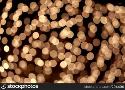 christmas elegant abstract background with bokeh lights. festive golden bokeh background