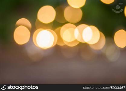 christmas fir tree with lights absgtract defocused background. christmas lights defocused background