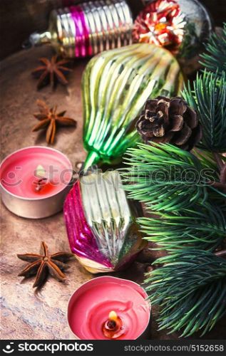 Christmas fir tree with retro decoration. Old-fashioned glass soviet christmas fur-tree toys on a bronze retro background.Christmas holidays