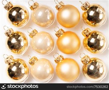 Christmas flat lay scene with bubbles golden decorations, top view. Christmas flat lay scene with golden decorations