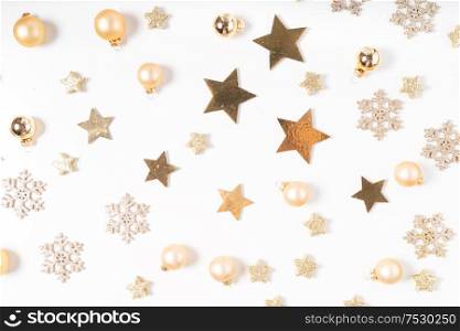 Christmas flat lay scene with golden decorations, top view. Christmas flat lay scene with golden decorations