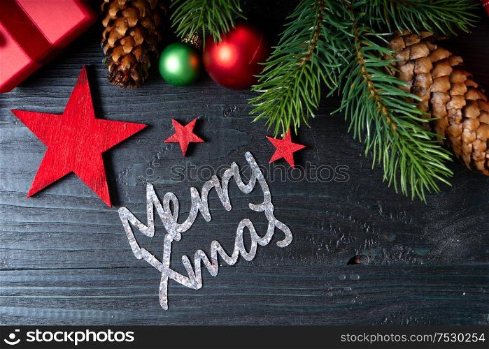 Christmas flat lay scene with red git boxes, Christmas celebration and gift giving concept, with merry xmas lettering. Christmas flat lay scene with golden decorations