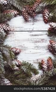 Christmas fraame decor from fir branches under the snow