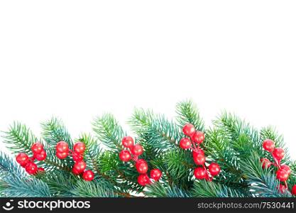 Christmas garland with red berries border on isolated white background. Christmas garland on white